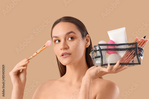 Beautiful young woman with ...