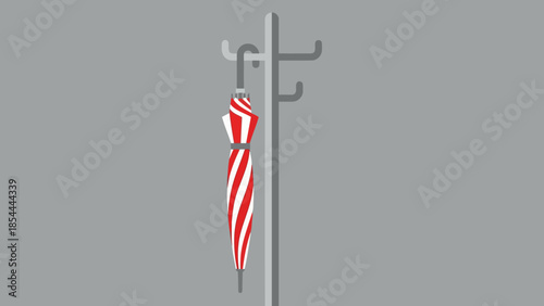 Striped scarf hanging on a metal coat rack.