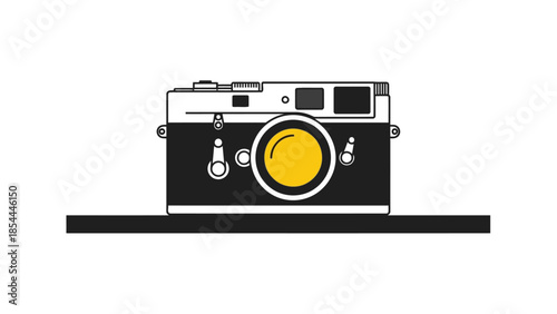 Vintage camera on black surface isolated studio shot.