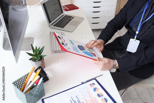 Male business analyst worki...