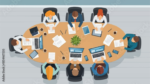 Diverse business team meeting around a large oval conference table discussing strategy.