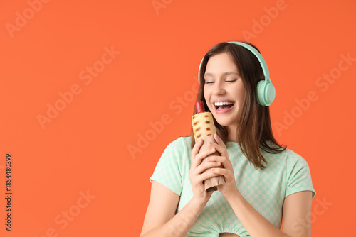 Young woman in headphones w...