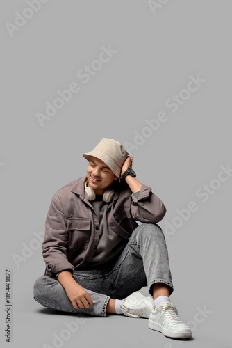 Stylish young man in bucket...