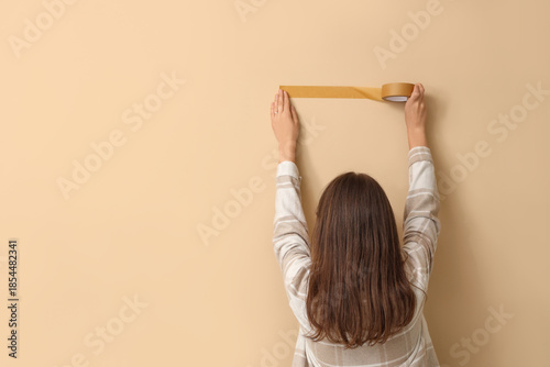 Young woman with adhesive t...