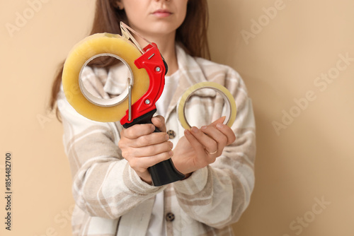 Young woman with adhesive t...