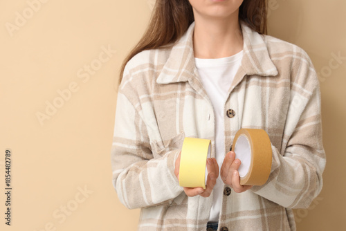 Young woman with adhesive t...