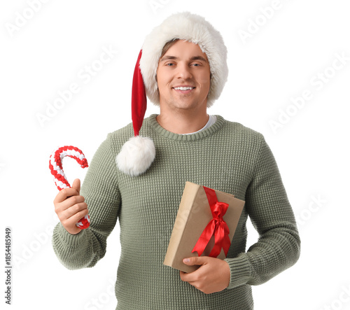 Young man in Santa hat hold...