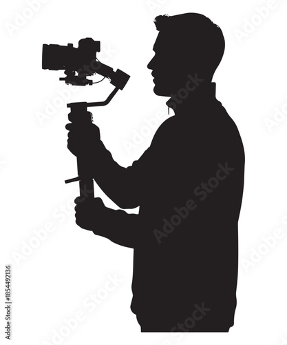 A person holding a professional video camera on a gimbal stabilizer silhouette