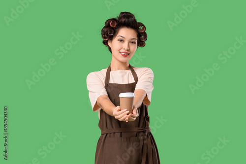 Female Asian barista with h...