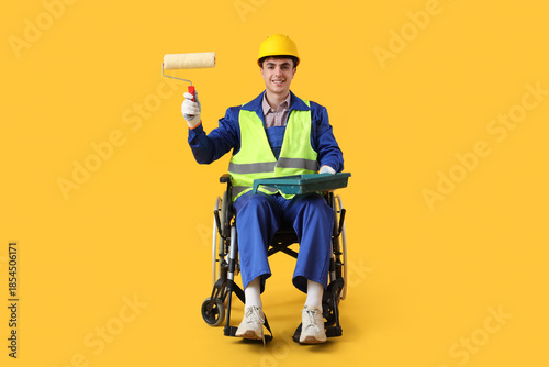 Male decorator in wheelchai...