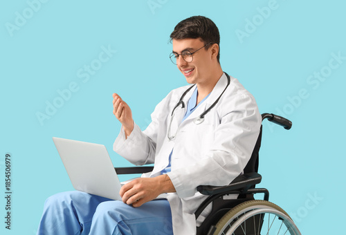 Male doctor in wheelchair w...
