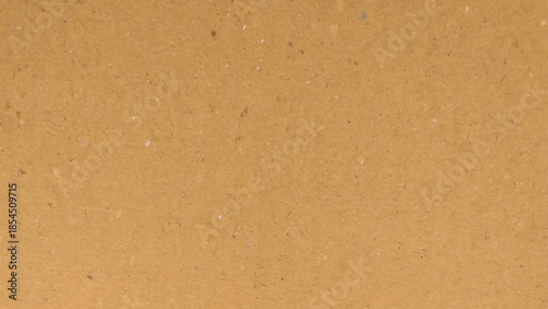 Cardboard grain texture background, vintage style yellow brown thick paper pattern.  Can be used as a pattern or background.
