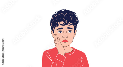 Sad young boy with curly hair and hand on cheek expressing sorrow or deep thinking while sitting isolated on a white background.