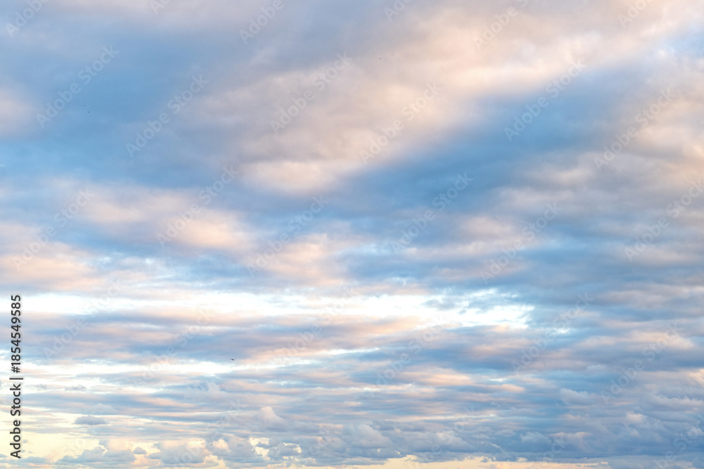 Obraz premium Cloud in the sky. Background with cloud. Gloomy sky with overcast clouds. Skyscape and cloudscape. Sky with clouds. Cloudy skyscape background. Cloudscape background. Wide sky