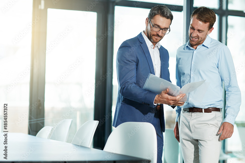 Obraz premium Business, men and discussion with folder in office for case opinion, contract feedback and planning. Space, teamwork and attorneys with file for legal advice, lawsuit settlement and evidence review