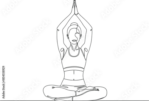 Woman in lotus pose with hands raised in meditation and yoga
