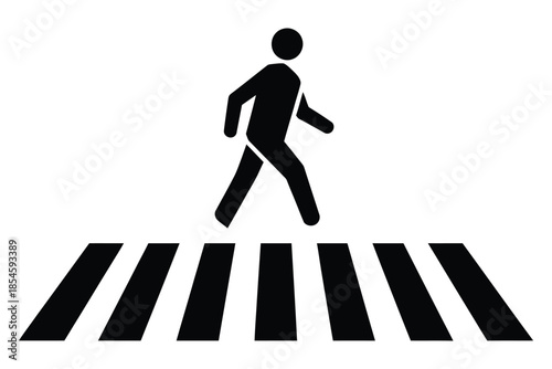 Black and white pedestrian crossing icon silhouette walking across a striped road marking sign