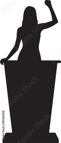 Silhouette of a woman speaking passionately at a podium with her fist raised