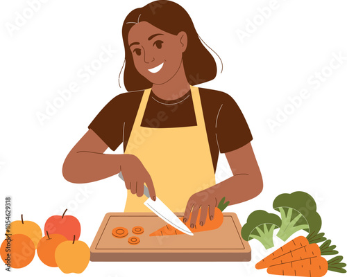 A person wearing an apron is slicing a carrot on a cutting board while preparing food.