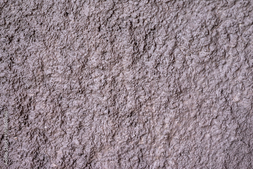 Wallpaper Mural Closeup view of a rough textured background of an exterior plaster wall. The wall is painted in black color and has a grunge texture. Perfect for use as a background or texture Torontodigital.ca