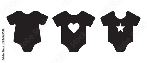 Black baby bodysuits with heart and star designs, isolated on white background.