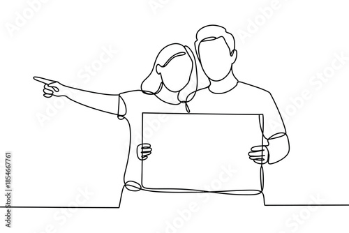 A couple holds a blank sign and points towards the future with their arms around each other.