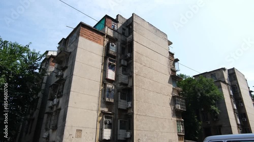 An aging residential apartment block built in the 1970s in Liuzhou, China. Housing reflects China’s planned-economy era urban development, living conditions in older Chinese cities.