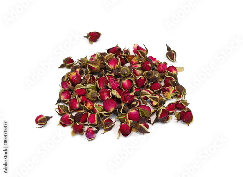 Dried Rose Buds. Dried red or pink rose buds. Natural dried rose tea isolated on white background  