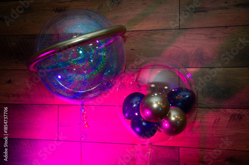 Bright multi-colored inflatable balloons for holiday decoration.