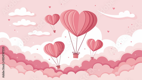Heart shaped hot air balloons flying in pink cloudy sky