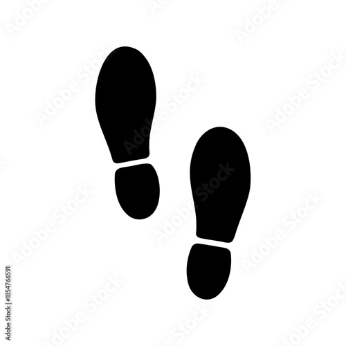 Two black footprint shapes, symbolic of steps, journey, or guidance on white background