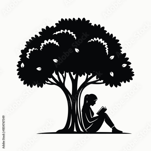 Reading under the tree
