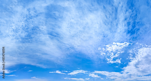 Bilde på lerret A raster image of a some cirrus cloud photographed against a blue sky
