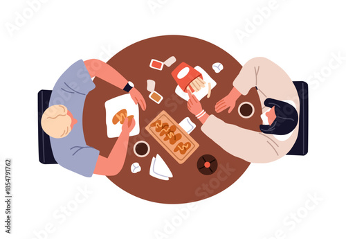 Couple eating, sitting at dining table with fast junk food, overhead top down view. People having meal, French fries, chicken wings, from above. Flat vector illustration isolated on white background
