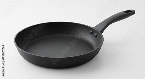 Wallpaper Mural Po�le � frire antiadh�sive noire moderne pos�e sur fond blanc pur sous un �clairage studio doux. AI Generated Torontodigital.ca