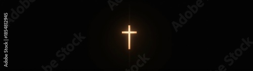Cross on a black background with a light coming from it