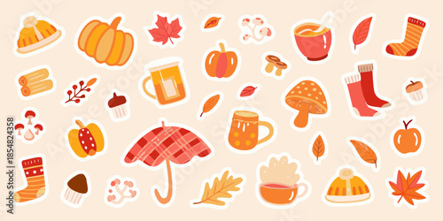 A colorful collection of autumn themed stickers including pumpkins and cozy clothing