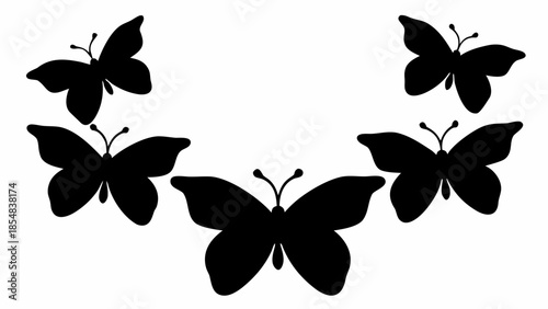 Five black butterflies silhouettes on white background