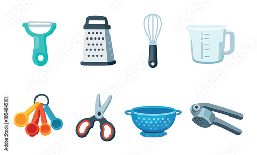 Colorful kitchen utensils set with peeler grater whisk and measuring cup