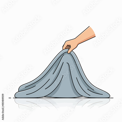 a blue blanket that is crumpled when lifted