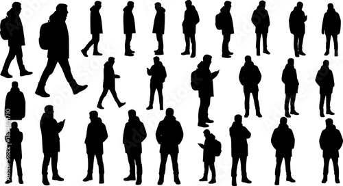 A comprehensive collection of black silhouettes featuring a young man in casual winter attire, captured in various walking and standing poses.