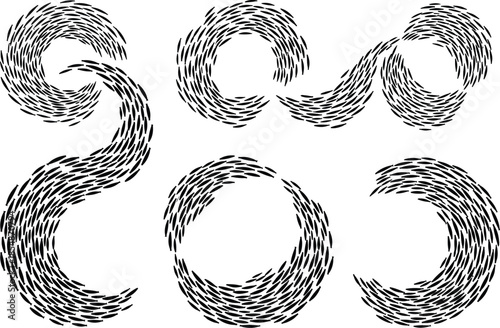 Black scribbled shapes on white background forming abstract patterns and designs