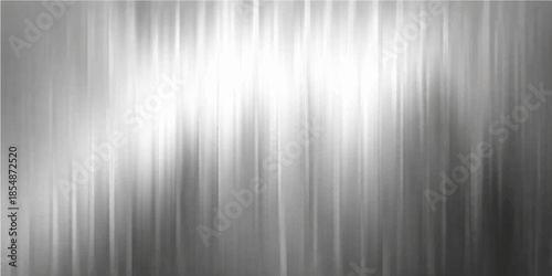 A polished silver brushed metal texture background featuring a shiny stainless steel surface with a light grey metallic pattern on a sleek aluminum sheet backdrop
