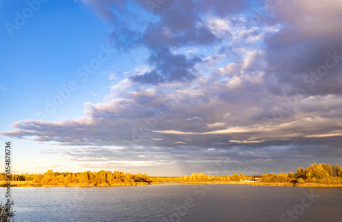 Lake with a cloudy sky in the background