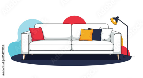 A modern white sofa with colorful pillows is placed next to a floor lamp, creating a stylish and comfortable interior design scene.