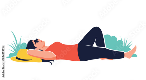Woman wearing sunglasses relaxing and lying on her back in the grass, enjoying a sunny day outdoors with a hat by her side.