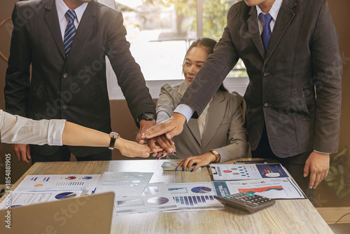 Group of business peoples meeting and join hands in office. Team work for success concept. Selected focus	