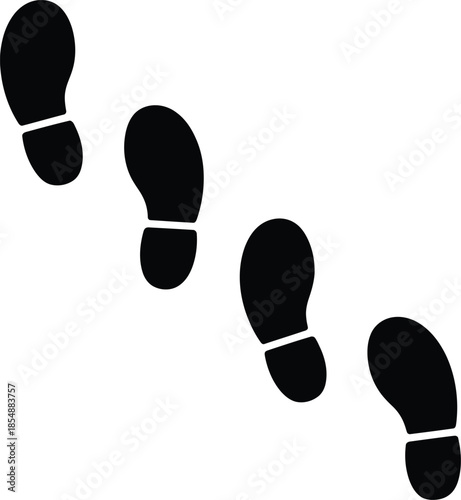 A simple graphic representation of four black footprints showing a walking path or direction