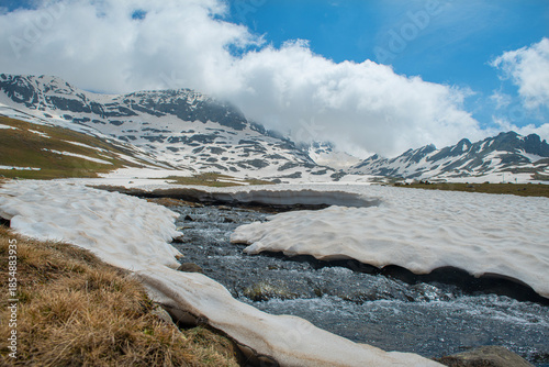 Snow melting in the Ovit Plateau in Rize. Snow turning into streams in autumn. Glaciers melting in spring. A view of snow and streams on a sunny day. Ovit Pass. Magnificent views from the Ovit Plateau