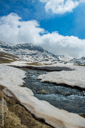 Snow melting in the Ovit Plateau in Rize. Snow turning into streams in autumn. Glaciers melting in spring. A view of snow and streams on a sunny day. Ovit Pass. Magnificent views from the Ovit Plateau